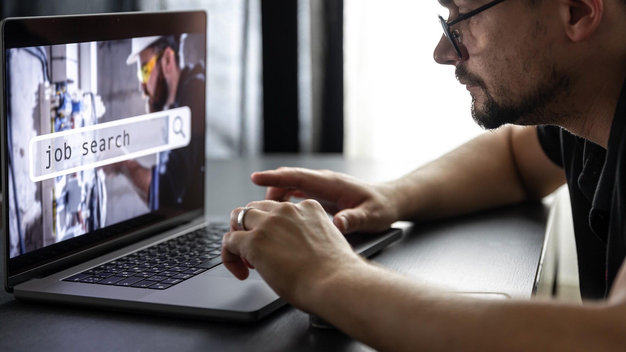 Man working on laptop and Information for the searching job, employment concept.